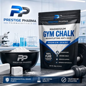 {"description":"The image is an advertisement for Prestige Pharma's Magnesium Gym Chalk product. The ad features a black and white bag of chalk with a blue stripe, accompanied by a bowl of chalk powder and a barbell on a table.nn* **Bag of Chalk:**n * The bag is black and white with a blue stripe.n * It has the company logo "Prestige Pharma Pharmaceuticals" at the top.n * The product name "MAGNESIUM GYM CHALK WEIGHTLIFTING ANTI-SKID" is written in large text.n * A blue banner below reads "PREMIUM GRADE".n * A circular icon on the bottom left states "100% PURE MAGNESIUM CARBONATE".n * Four bullet points highlight the benefits: "ENHANCES GRIP", "ABSORBS SWEAT", "REDUCES SLIPPING", and "IMPROVES PERFORMANCE".n * The net weight of the product is 300g (10.58 oz).n* **Bowl of Chalk Powder:**n * A black bowl filled with white chalk powder.n * The company logo "Prestige Pharma Pharmaceuticals" is printed on the bowl.n* **Barbell:**n * A silver barbell with black weights on either end.n* **Background:**n * A laboratory setting with various scientific equipment, including beakers, test tubes, and a microscope.n* **Company Logo:**n * The Prestige Pharma logo is displayed prominently in the top-left corner.n* **Additional Text:**n * Three lines of text at the bottom of the image read:n * "PHARMACEUTICAL GRADE PURITY"n * "LAB TESTED QUALITY"n * "TRUSTED BY ATHLETES"nnThe overall design of the advertisement aims to convey a sense of professionalism and quality, emphasizing the product's purity, effectiveness, and trustworthiness."}